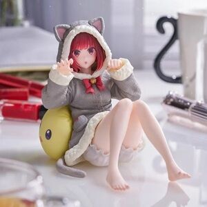 Gray Cat-Themed Figurine with Red Accents